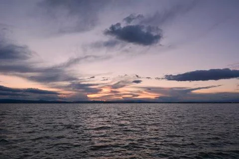 Landscape of a lake with storm clouds Stock Photos