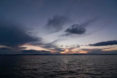 Landscape of a lake with storm clouds Stock Photos