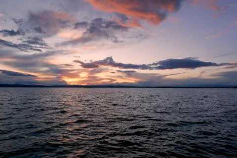 Landscape of a lake with storm clouds Stock Photos