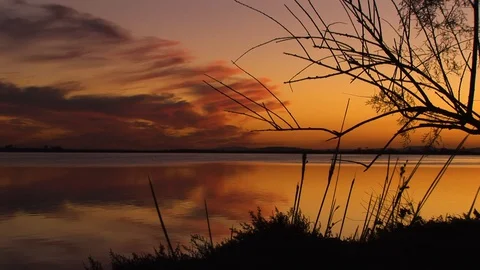 Landscape Of A Lake At Sunset Stock Footage 127920188