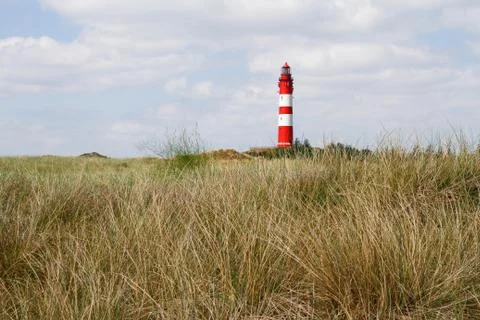 Landscape with a lighthouse Stock Photos