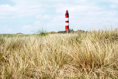 Landscape with a lighthouse Stock Photos