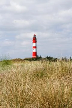 Landscape with a lighthouse Stock Photos