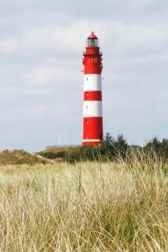 Landscape with a lighthouse Stock Photos