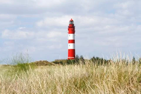 Landscape with a lighthouse Stock Photos