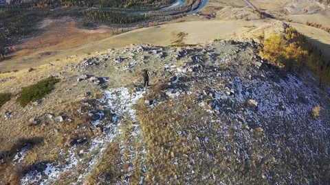 Landscape with a man on a background of mountains Stock Footage 220034181