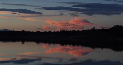 Landscape mirror dark scene of sunset golden hour and clouds reflections 스톡 동영상 96005924