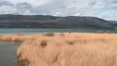 Landscape with mountain, clouds and water. Nature reserve. Stock Footage 237374186