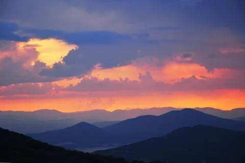 Landscape with mountain range at the sunset Stock Photos