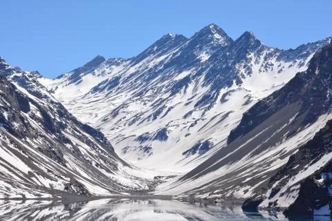 Landscape of mountain snow, ski resort and lagoon in Santiago, Chile Stock Photos