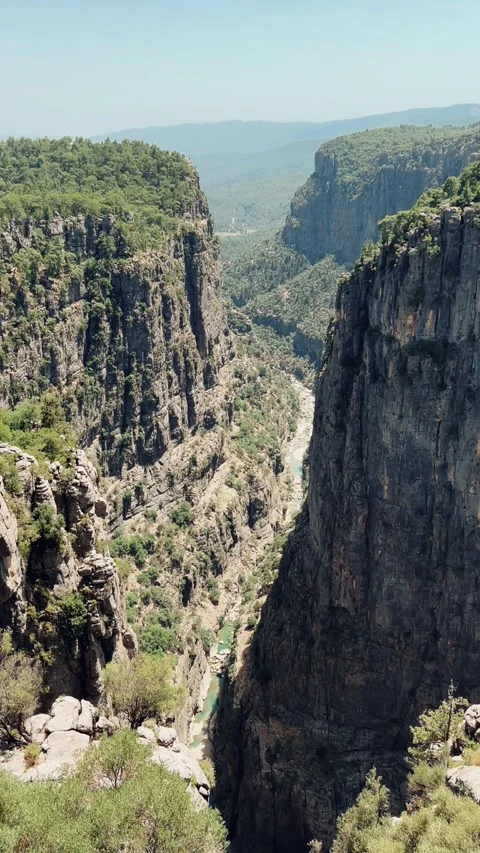 The landscape of a mountain valley with forests and cliffs.  Stock Footage 283297131