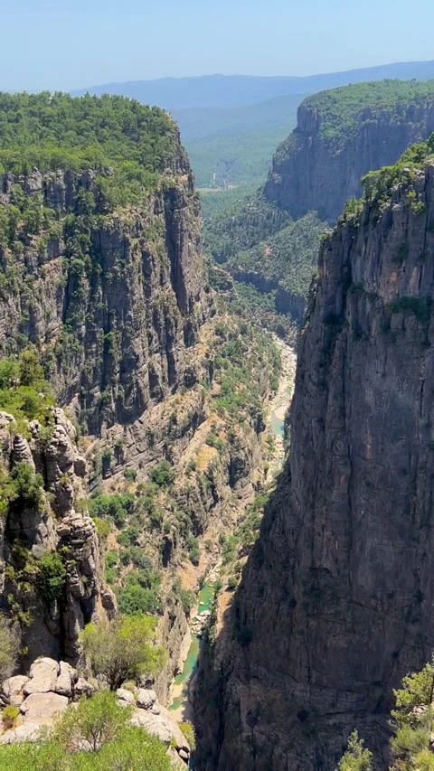 The landscape of a mountain valley with forests and cliffs.  Stock Footage 283297247