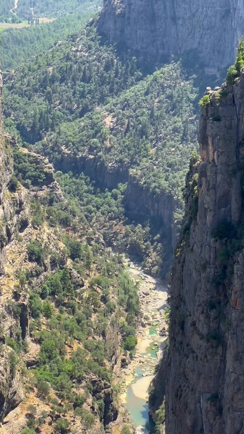 The landscape of a mountain valley with forests and cliffs.  Stock Footage 283298956