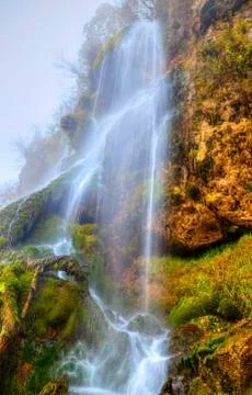 Landscape with mountain waterfall Stock Photos