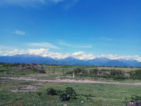 Landscape with mountains and clouds Stock Photos