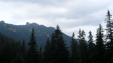 Landscape of mountains and clouds in Romania during the day Stock Footage 152555432