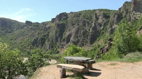 Landscape in the mountains with a bench 動画素材 75367117