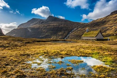 Landscape. Mountains, fields, blue sky, house. Beautiful view landscape in .. Stock Photos