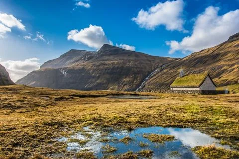 Landscape. Mountains, fields, blue sky, house. Beautiful view landscape in .. Stock Photos