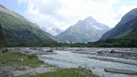 Landscape with mountains, forest and a river in front. beautiful scenery nature  Stock Footage 265481194
