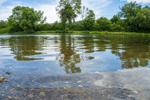 Landscape with mountains, forest and a river in front. beautiful scenery. Czech Stock Photos
