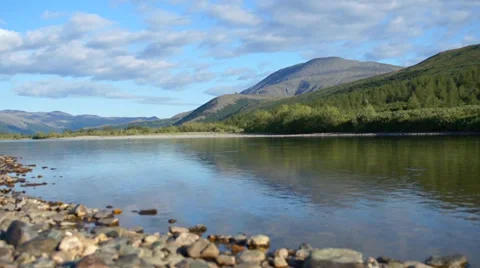 Landscape with mountains trees and a river Stock Footage 29519426
