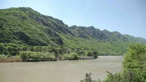 Landscape with mountains trees and river Vídeos de archivo 77552977