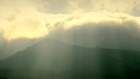 Landscape mountains with trees. Sun rays, sunny day. Calm natural scene. 库存影片 253109200