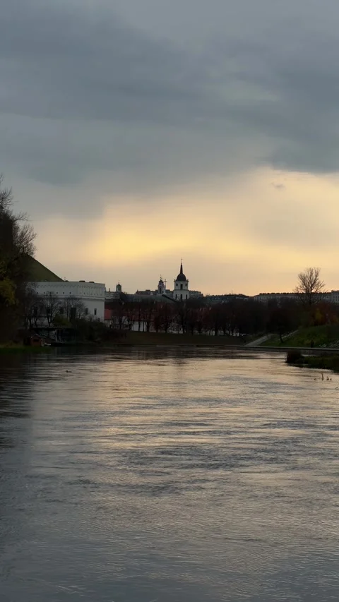 Landscape of Neris river and Vilnius city center in November. Vertical video Stock Footage 257351256