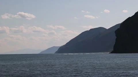 Landscape with ocean and rocks, close-up Stock Footage 310841904