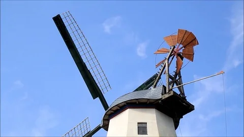 Landscape old grain mill against blue sky Stock Footage 74439793