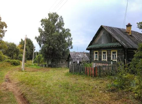 Landscape with an old rustic house Stock Photos