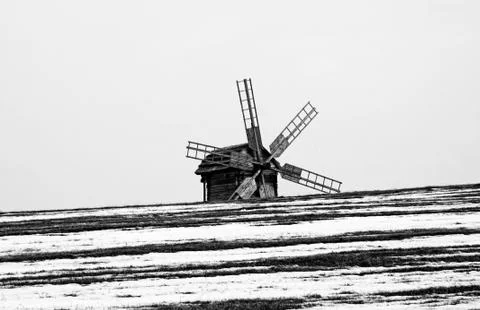 Landscape with old windmill Stock Photos