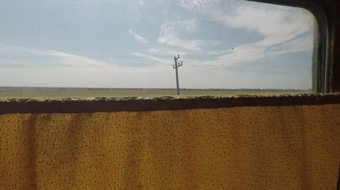 The landscape from the open window of the train on a hot summer day Stock Footage 127425289