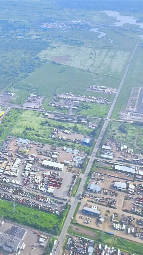 Landscape outside the window while plane landing and touch down on runway. Stock Footage 312599360