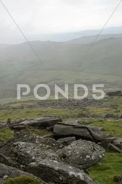 Landscape over dartmoor national park in autumn with rocks and foliage Stock Photos