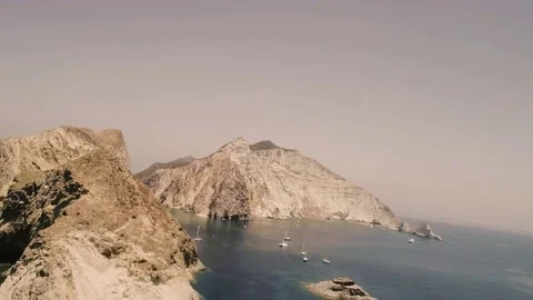 Landscape of Palmarola Island in Italy with cliff and boats Stock Footage
