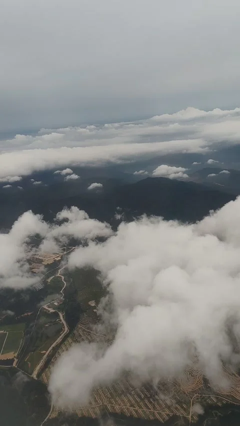 A landscape partially covered by clouds Stock Footage 326006278