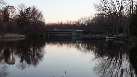 Landscape in Perth, Ontario, Canada in spring. River bank during sunset with Stock Footage 310630074