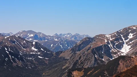 Landscape of Polish mountain range Tatry covered with snow and valley Stock Footage 121370545
