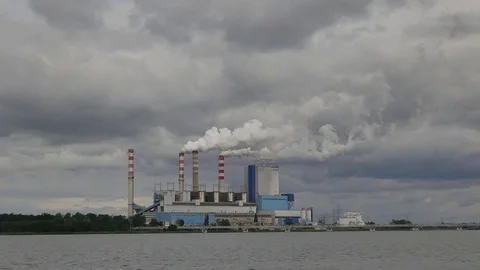 Landscape with powerplant on the horizon. Stock Footage 79696342