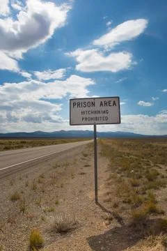 Landscape prison and warning sign Stock Photos