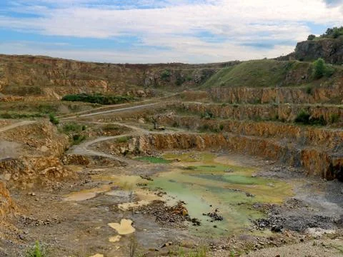 Landscape of the quarry for exploitation Stock Photos