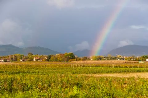 Landscape with rainbow Stock Photos