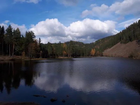 Landscape with the reflection of the sky in water Stock Photos