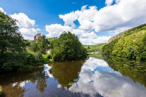 Landscape with reflection of water, clouds, forest, trees Stock Photos