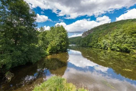 Landscape with reflection of water, clouds, forest, trees Stock-Fotos