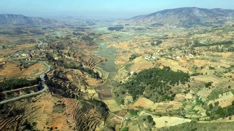 Landscape with rice fields in central Madagascar, Aerial view , 4K footage Stock Footage 231251670