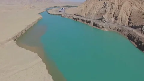 Landscape of the river 'Amu Darya' which is a natural border between Stock Footage 118681079