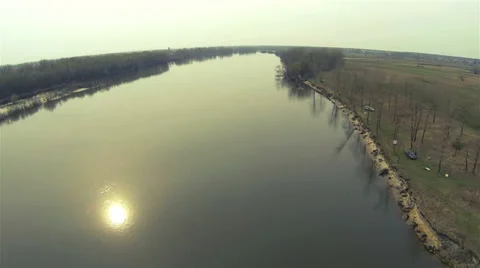 Landscape with  river and solar reflection. Aerial Decrease Stock Footage 36973602